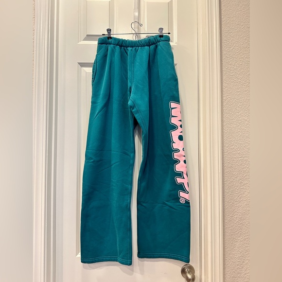 Madhappy signature fleece sweatpants in teal with pink...